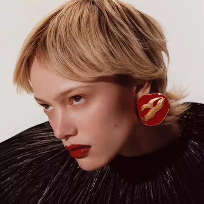 Pendientes de labios rojo fuego